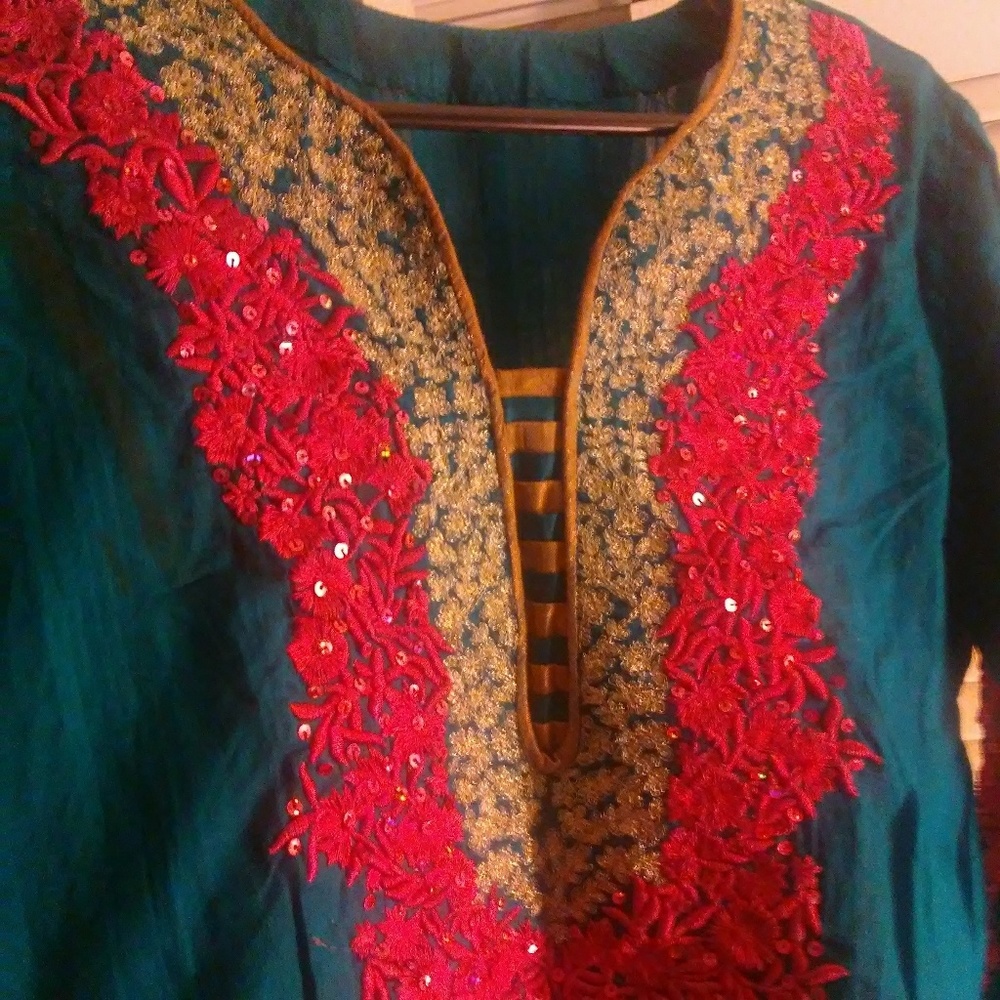 Teal blue ,gold and pink embroidery kameez.